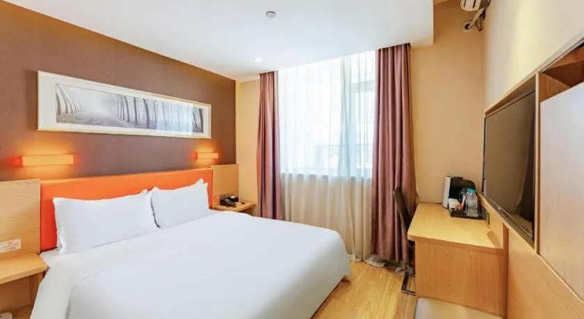 Bed in IU Hotel Tianjin Youyi Road Meijiang Exhibition Meiniu Metro Station