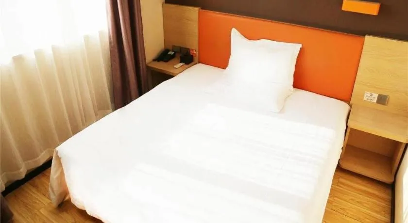 Bed in IU Hotel Tianjin Youyi Road Meijiang Exhibition Meiniu Metro Station