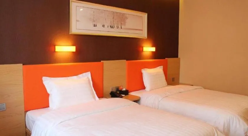 Bed in IU Hotel Tianjin Youyi Road Meijiang Exhibition Meiniu Metro Station