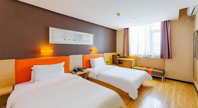 Bed in IU Hotel Tianjin Youyi Road Meijiang Exhibition Meiniu Metro Station