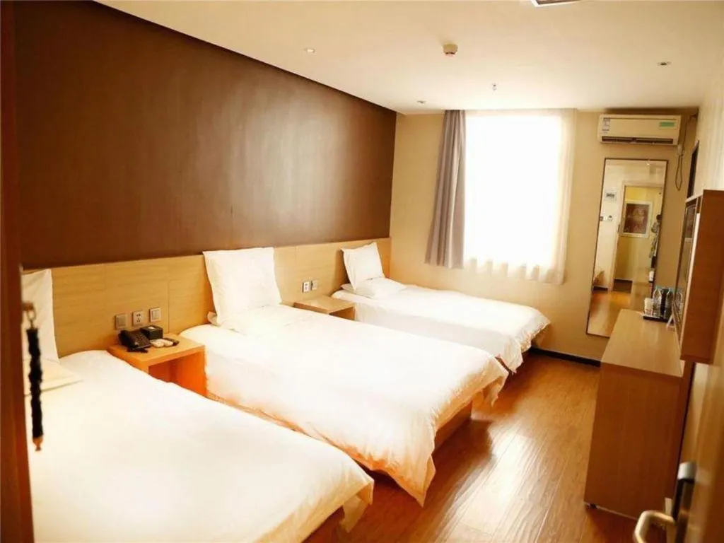 Bed in IU Hotel Tianjin Youyi Road Meijiang Exhibition Meiniu Metro Station