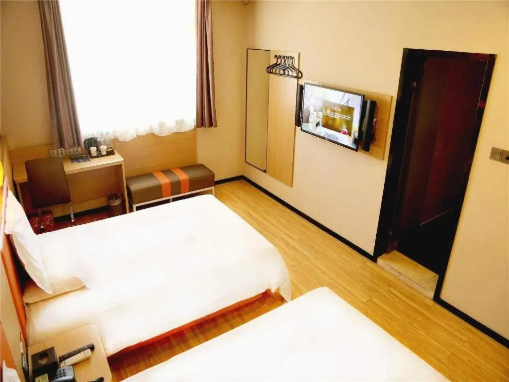 Bed in IU Hotel Tianjin Youyi Road Meijiang Exhibition Meiniu Metro Station