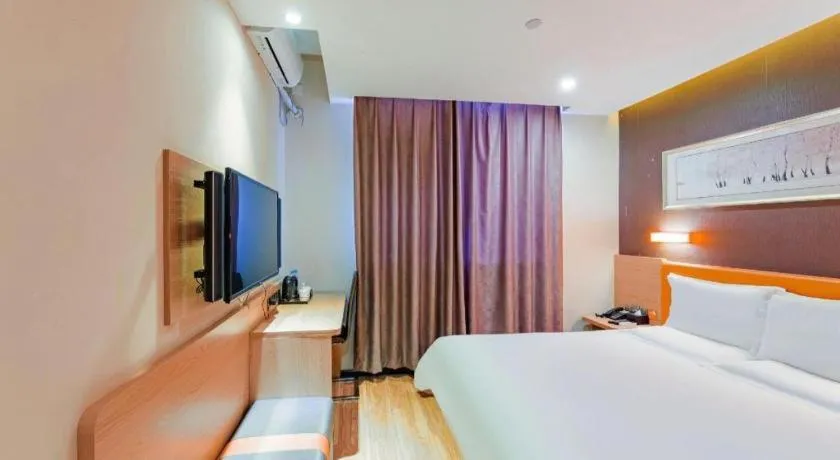Bed in IU Hotel Tianjin Youyi Road Meijiang Exhibition Meiniu Metro Station