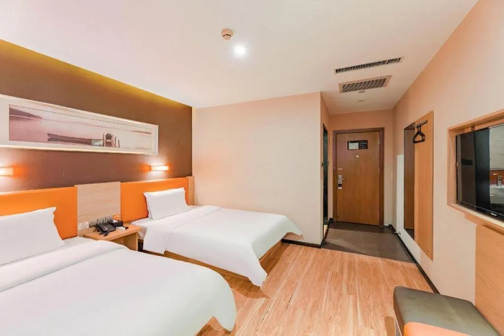 Bed in IU Hotel Tianjin Youyi Road Meijiang Exhibition Meiniu Metro Station