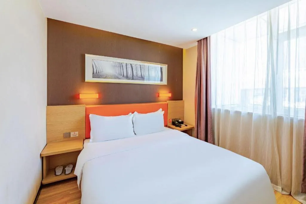 Bed in IU Hotel Tianjin Youyi Road Meijiang Exhibition Meiniu Metro Station