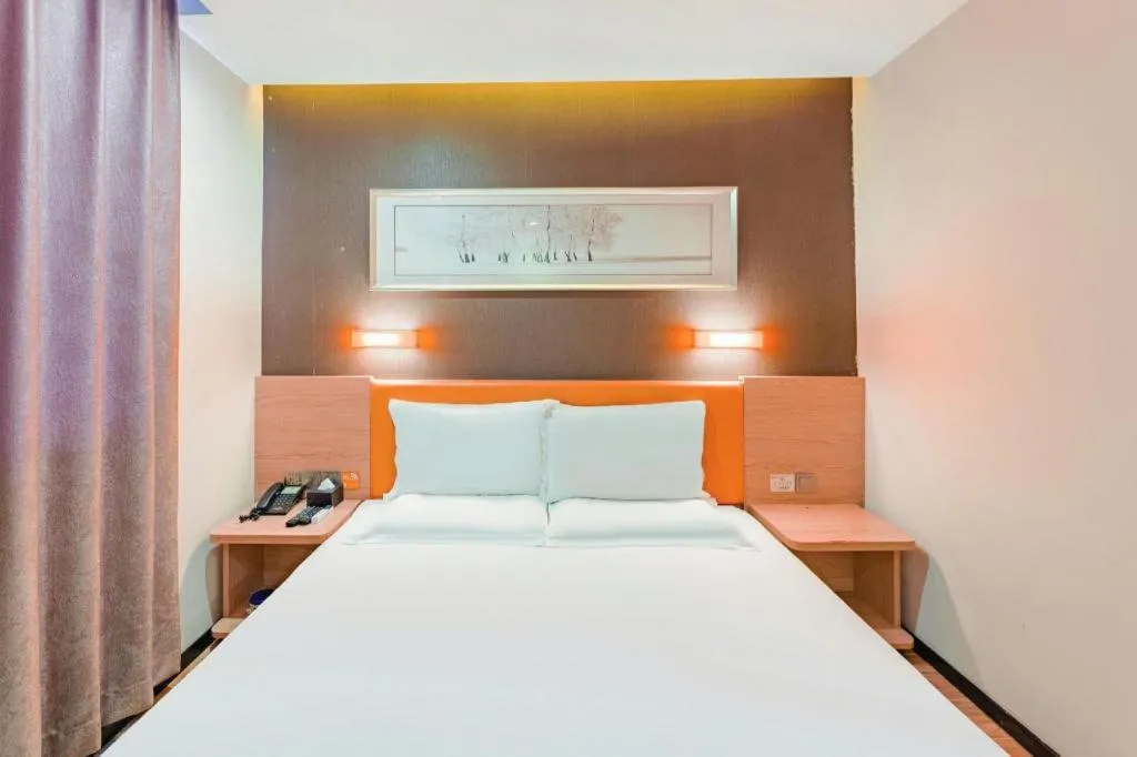 Bed in IU Hotel Tianjin Youyi Road Meijiang Exhibition Meiniu Metro Station