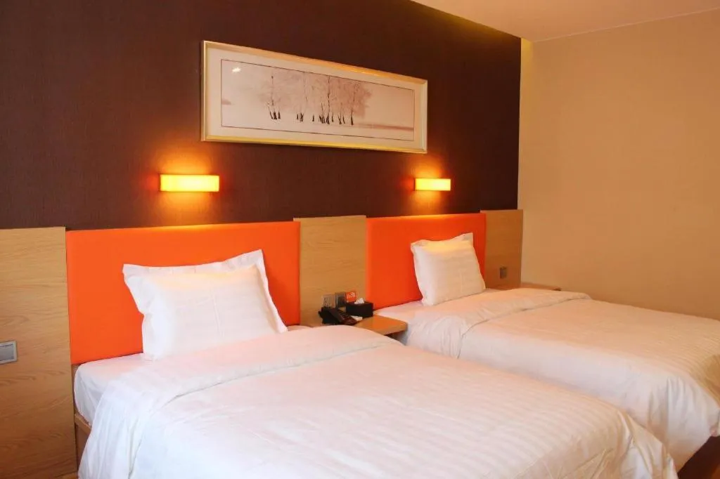 Bed in IU Hotel Tianjin Youyi Road Meijiang Exhibition Meiniu Metro Station