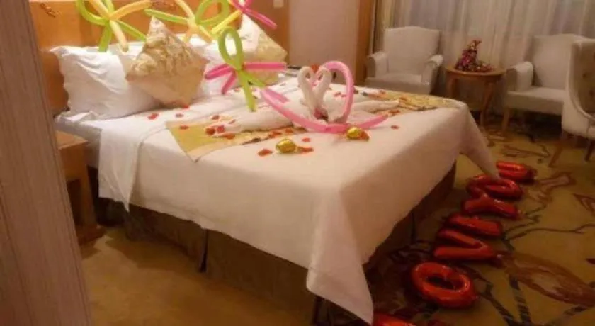 Bed in Vienna Hotel Guangxi Liuzhou Xijiang Vientiane City