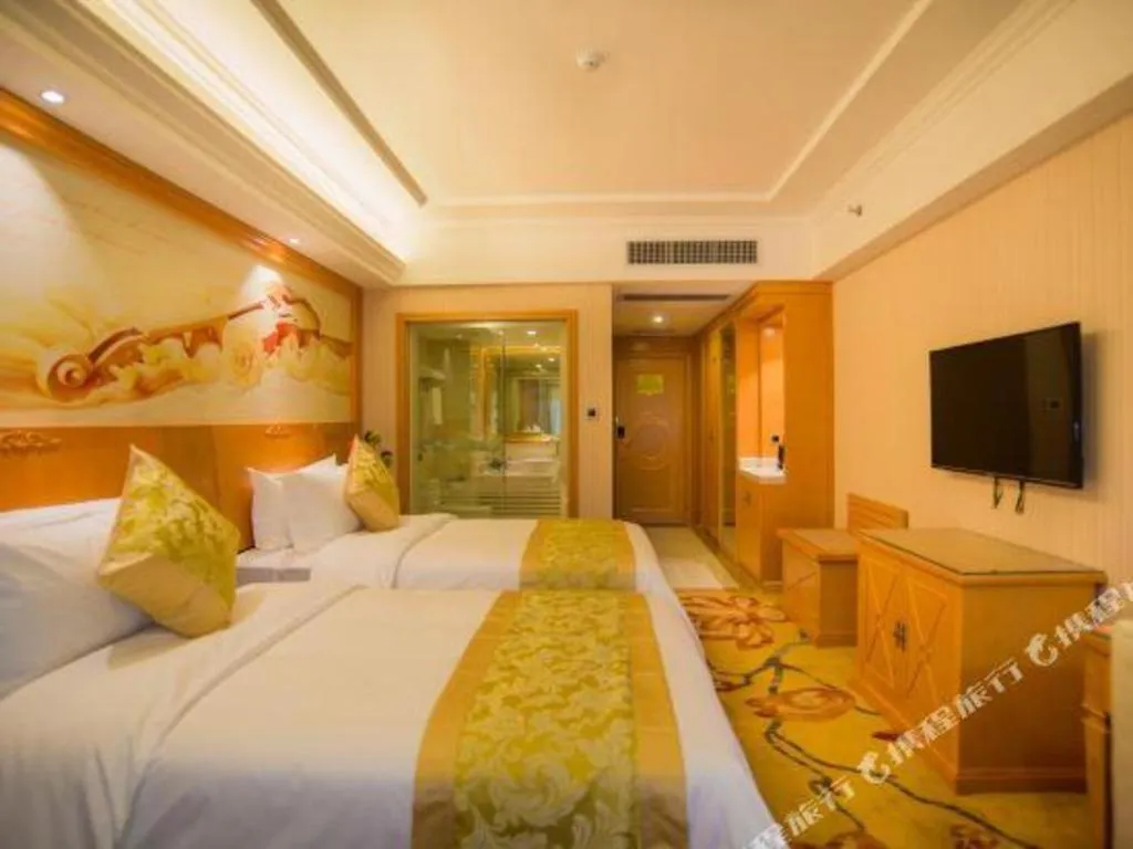 Bed in Vienna Hotel Guangxi Liuzhou Xijiang Vientiane City