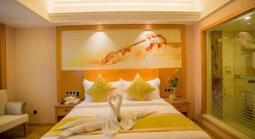 Bed in Vienna Hotel Guangxi Liuzhou Xijiang Vientiane City