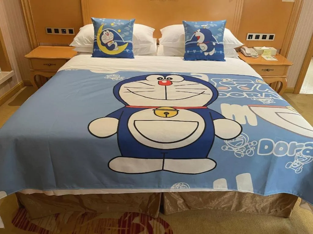 Bed in Vienna Hotel Guangxi Liuzhou Xijiang Vientiane City