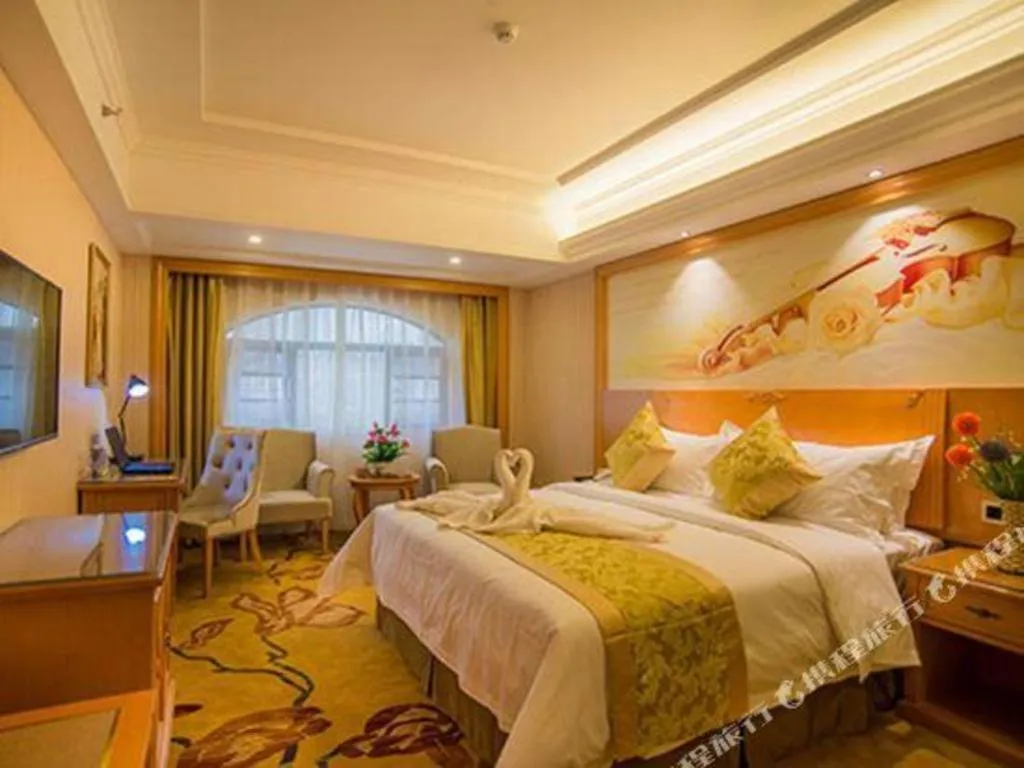 Bed in Vienna Hotel Guangxi Liuzhou Xijiang Vientiane City