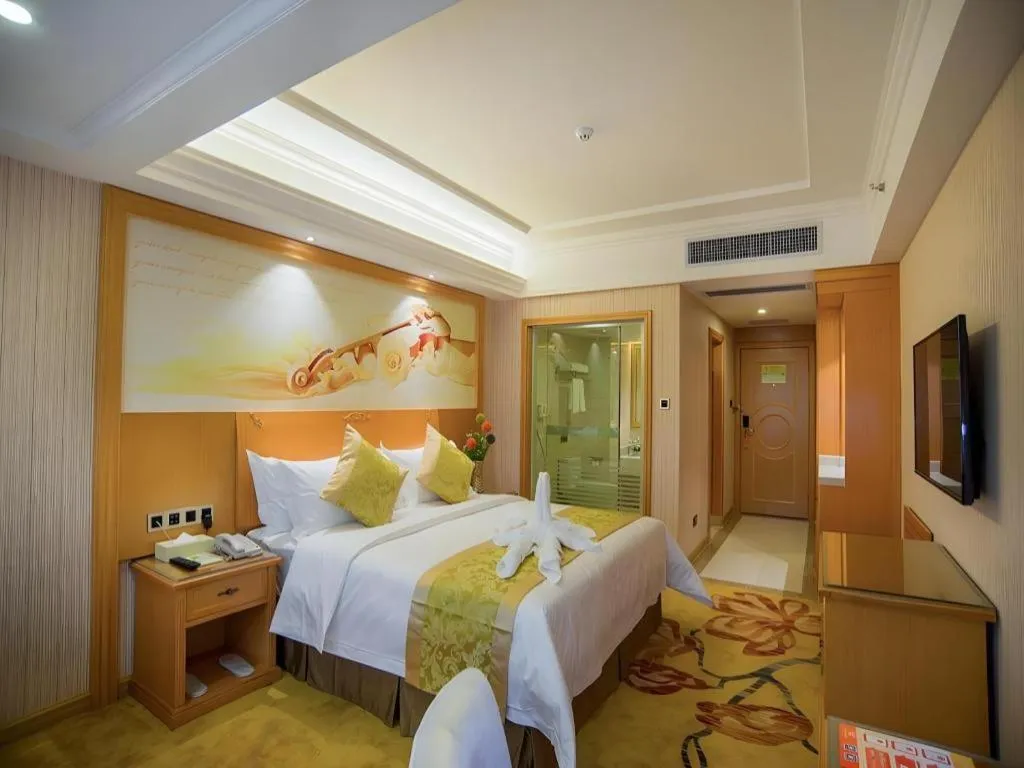 Bed in Vienna Hotel Guangxi Liuzhou Xijiang Vientiane City