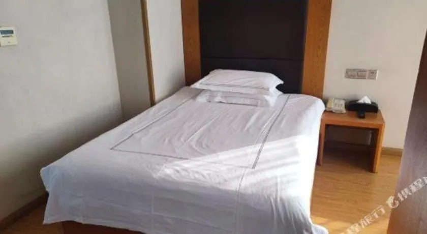 Bed in Warmly Hotel Suzhou Shuanghuwan