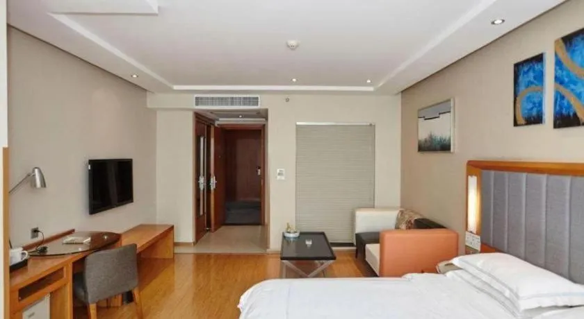 Bed in Warmly Hotel Suzhou Shuanghuwan