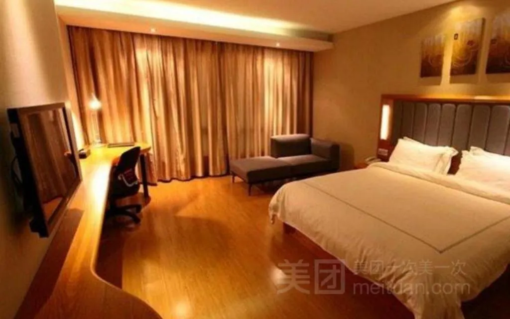 Bed in Warmly Hotel Suzhou Shuanghuwan