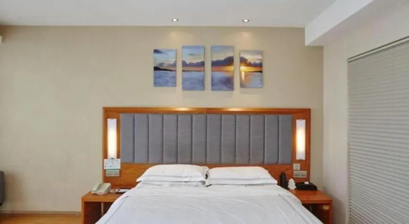 Bed in Warmly Hotel Suzhou Shuanghuwan