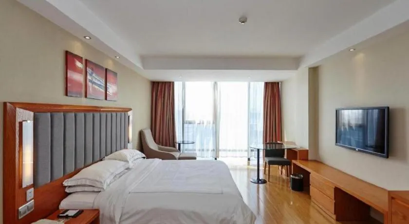 Bed in Warmly Hotel Suzhou Shuanghuwan