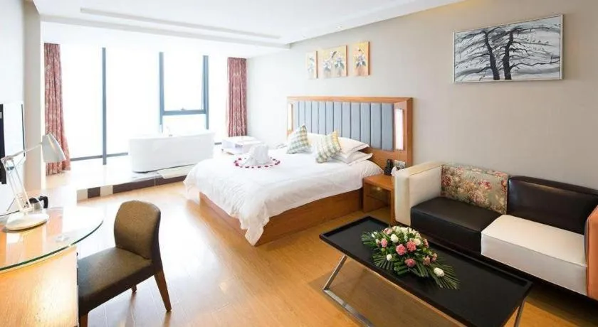 Bed in Warmly Hotel Suzhou Shuanghuwan