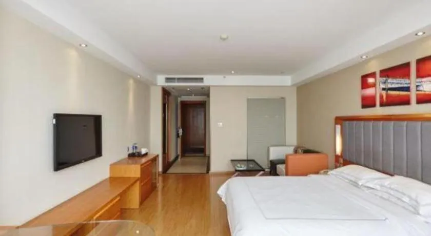 Bed in Warmly Hotel Suzhou Shuanghuwan