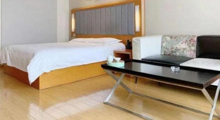 Bed in Warmly Hotel Suzhou Shuanghuwan