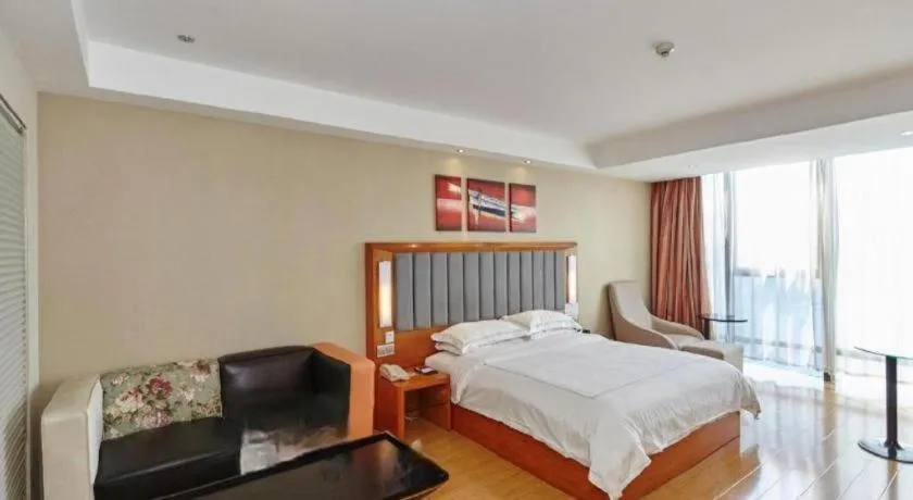 Bed in Warmly Hotel Suzhou Shuanghuwan