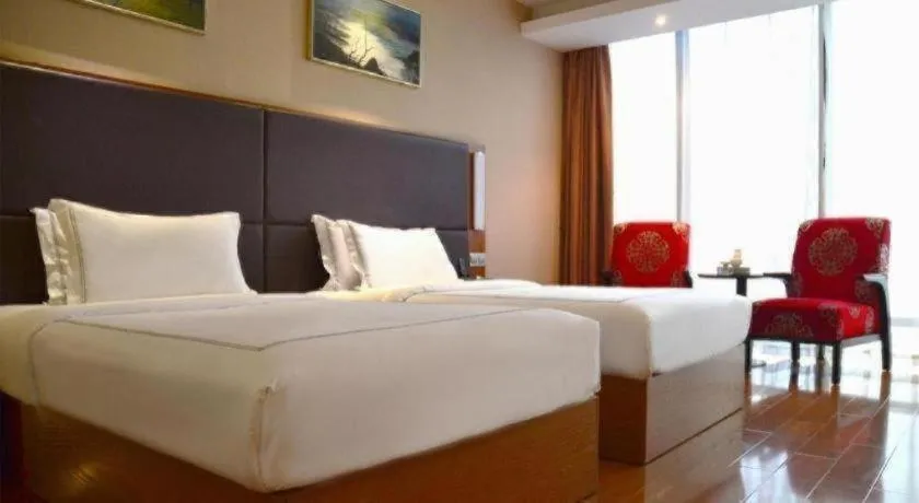 Bed in Warmly Hotel Suzhou Shuanghuwan