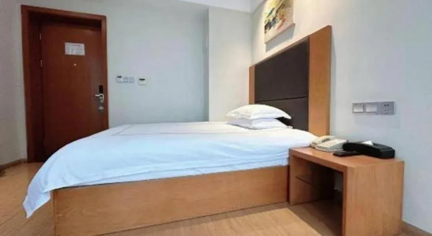 Bed in Warmly Hotel Suzhou Shuanghuwan