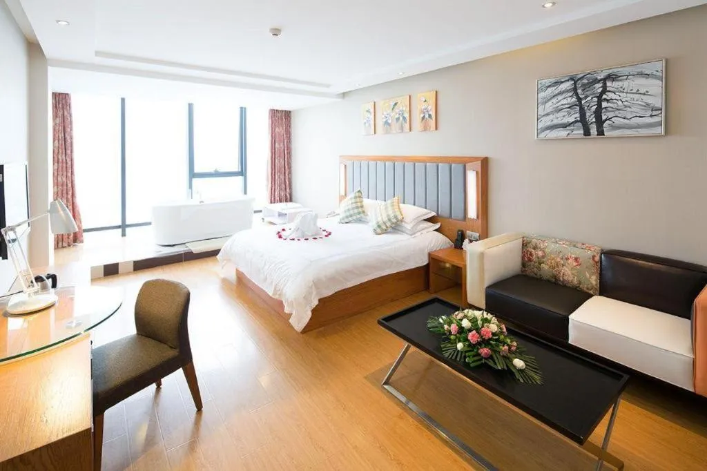 Bed in Warmly Hotel Suzhou Shuanghuwan