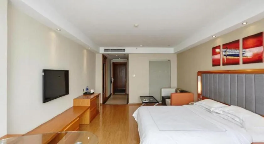 Bed in Warmly Hotel Suzhou Shuanghuwan