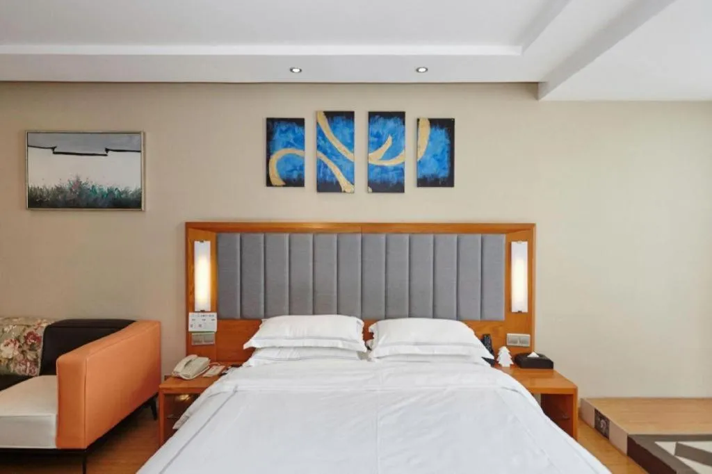 Bed in Warmly Hotel Suzhou Shuanghuwan