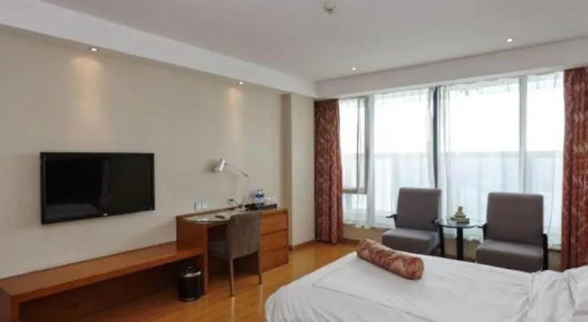 Bed in Warmly Hotel Suzhou Shuanghuwan