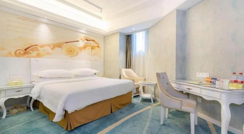 Bed in Vienna Hotel Guiyang Jiaxiulou Jichang Road