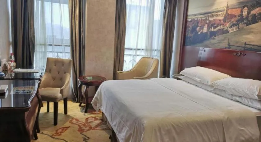 Bed in Vienna Hotel Guiyang Jiaxiulou Jichang Road