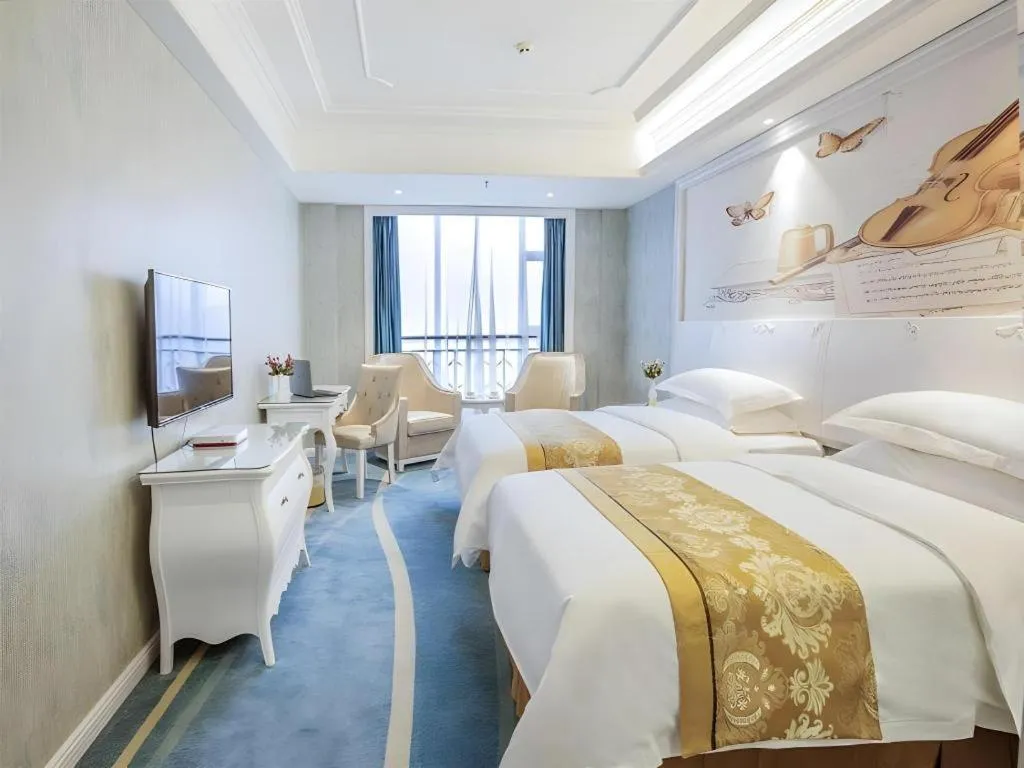 Bed in Vienna Hotel Guiyang Jiaxiulou Jichang Road