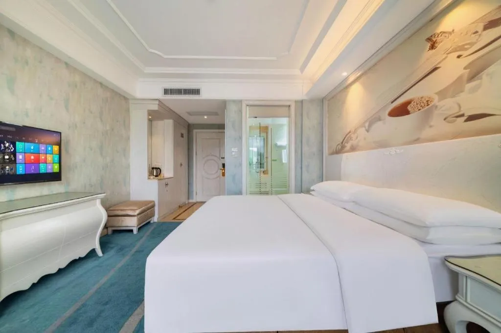 Bed in Vienna Hotel Guiyang Jiaxiulou Jichang Road