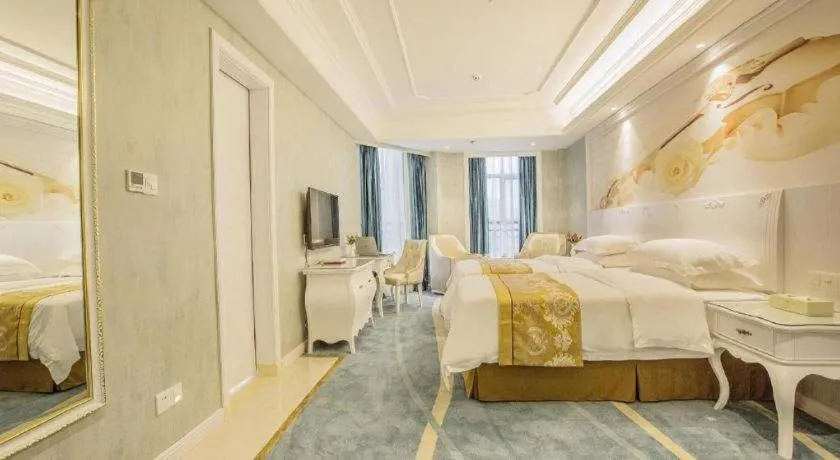 Bed in Vienna Hotel Guiyang Jiaxiulou Jichang Road