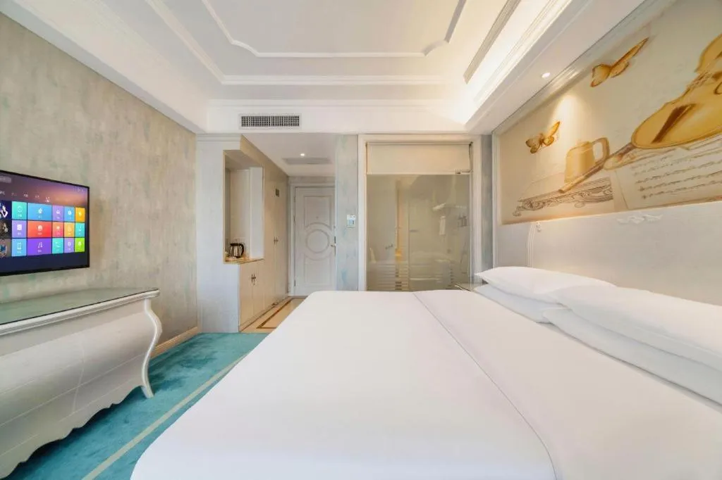 Bed in Vienna Hotel Guiyang Jiaxiulou Jichang Road