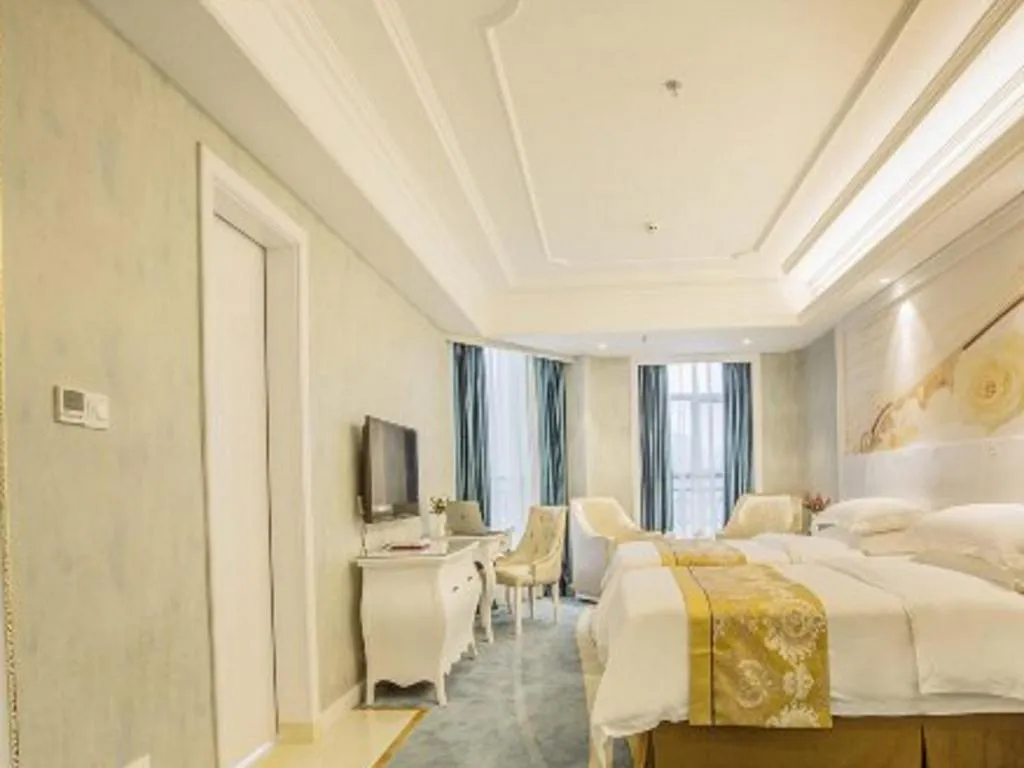 Bed in Vienna Hotel Guiyang Jiaxiulou Jichang Road