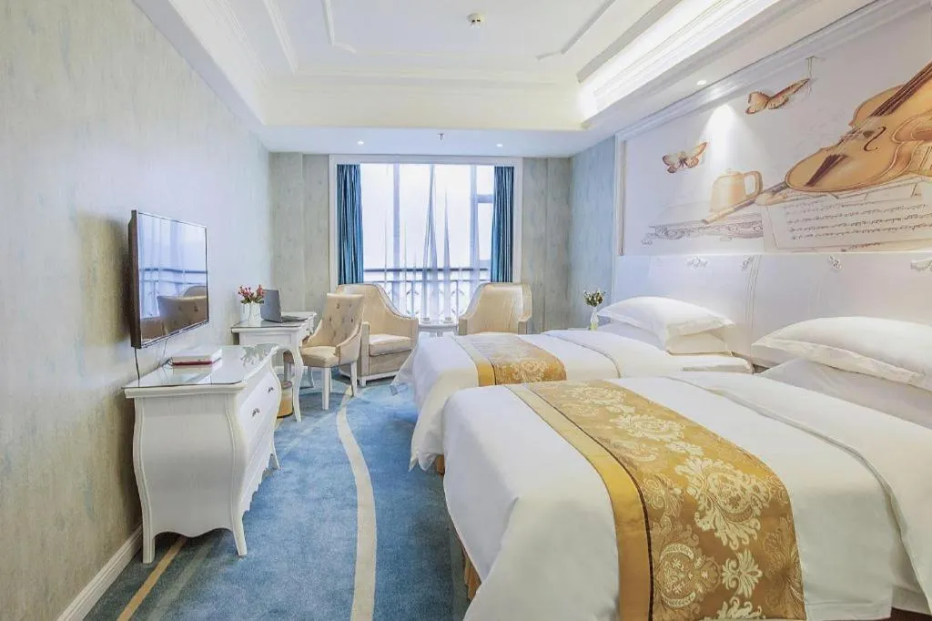 Bed in Vienna Hotel Guiyang Jiaxiulou Jichang Road