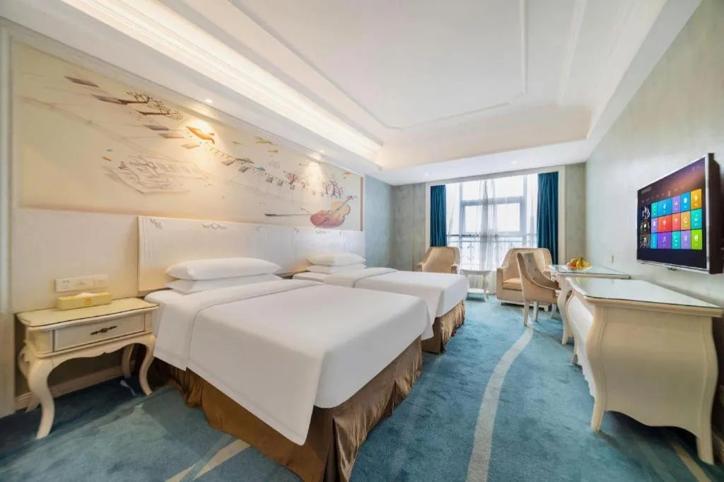 Bed in Vienna Hotel Guiyang Jiaxiulou Jichang Road