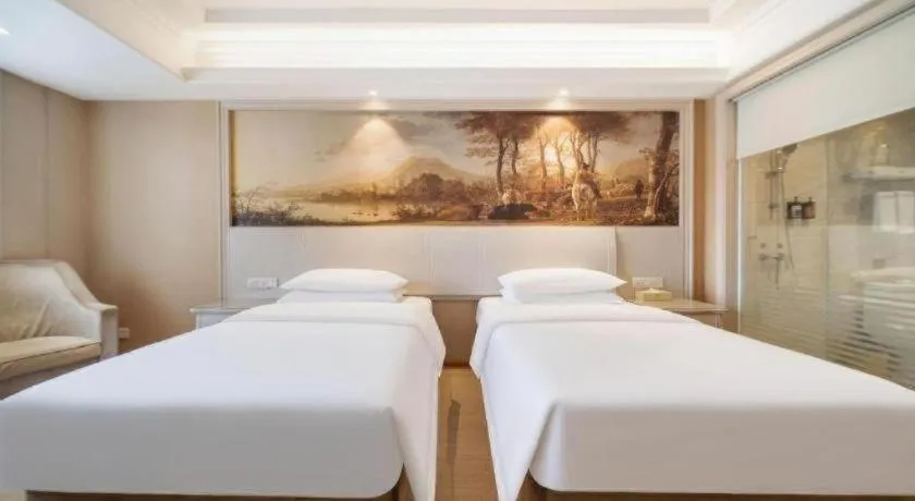 Bed in Vienna Hotel Guiyang Jiaxiulou Jichang Road