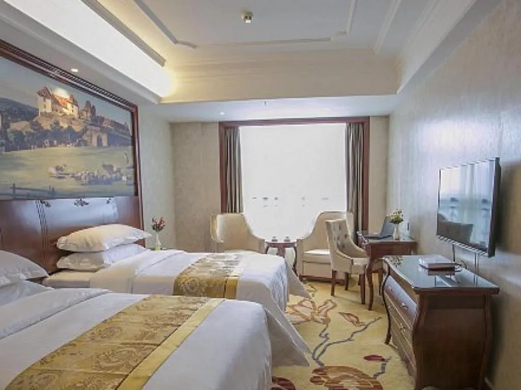 Bed in Vienna Hotel Guiyang Jiaxiulou Jichang Road