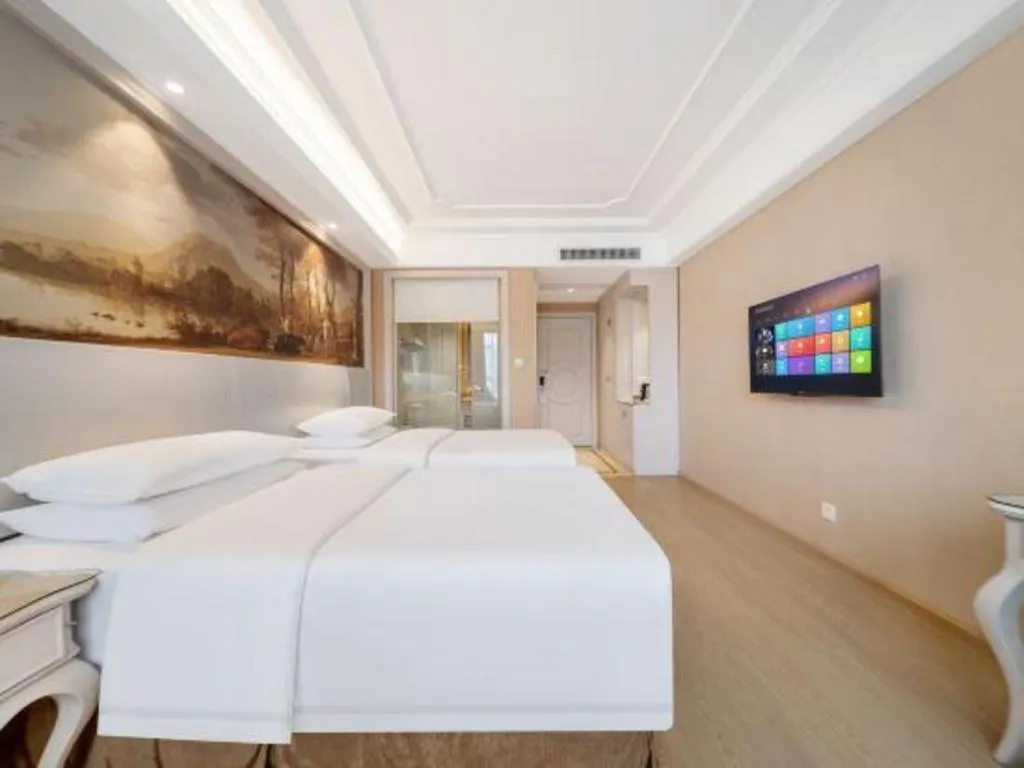 Bed in Vienna Hotel Guiyang Jiaxiulou Jichang Road