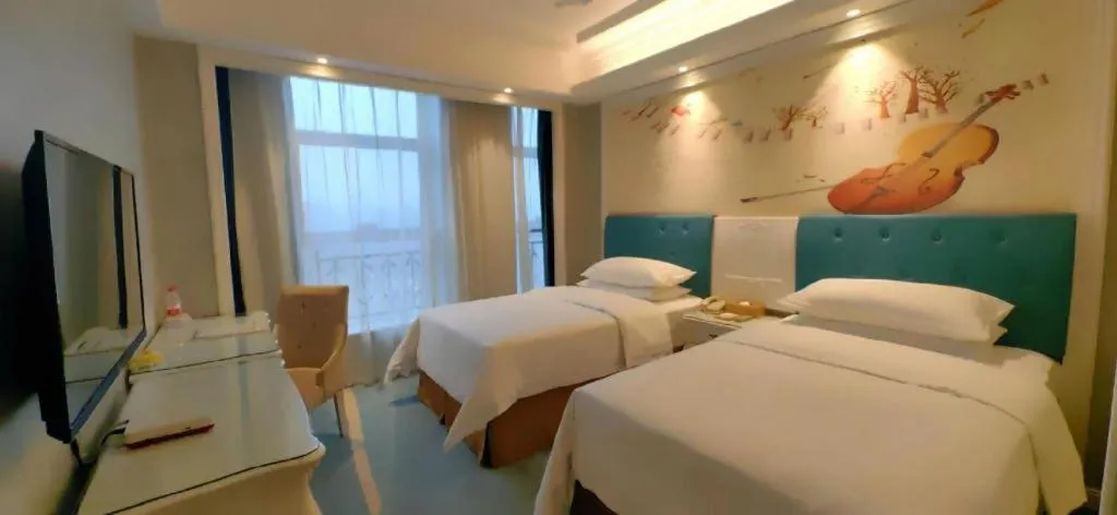 Bed in Vienna Hotel Guiyang Jiaxiulou Jichang Road