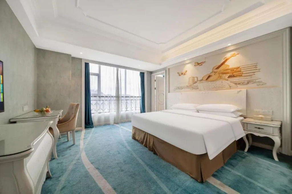 Bed in Vienna Hotel Guiyang Jiaxiulou Jichang Road