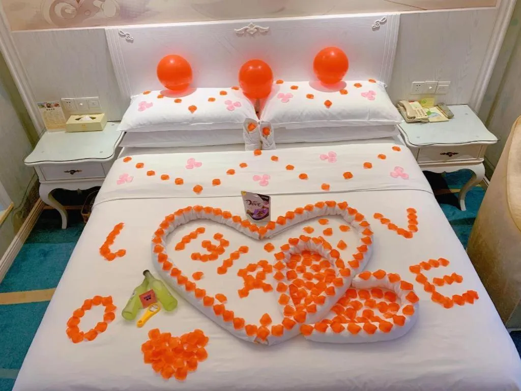 Bed in Vienna Hotel Guiyang Jiaxiulou Jichang Road