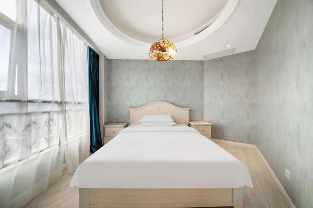 Bed in Vienna Hotel Guiyang Jiaxiulou Jichang Road