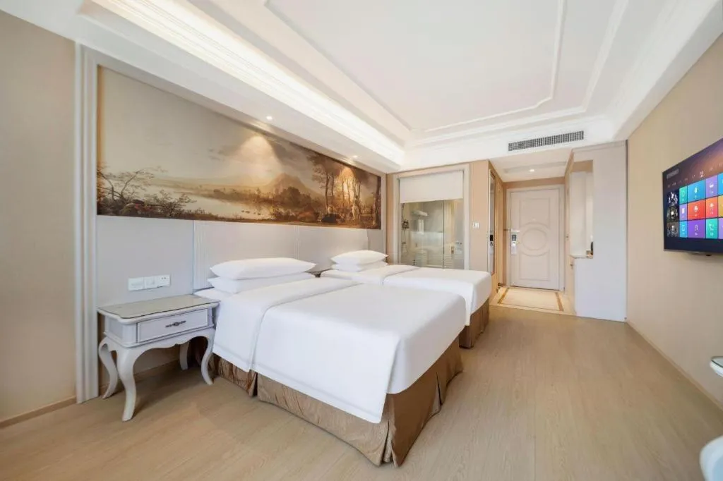 Bed in Vienna Hotel Guiyang Jiaxiulou Jichang Road