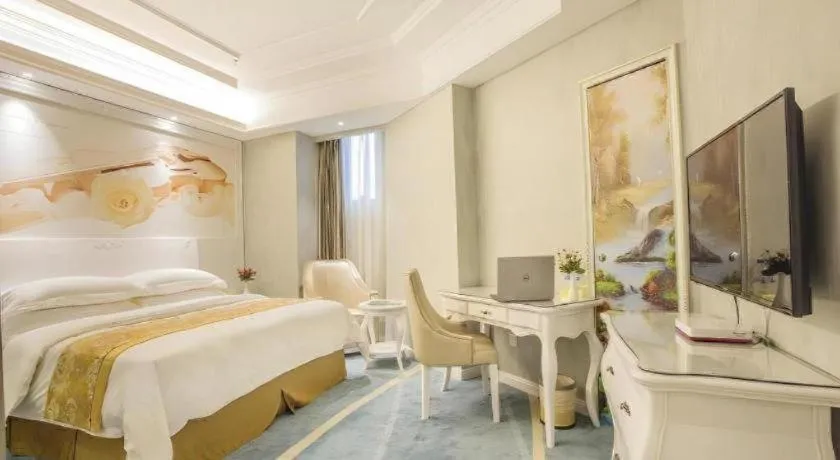 Bed in Vienna Hotel Guiyang Jiaxiulou Jichang Road